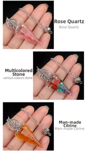 Three crystal dowsing pendulums with Tree of Life charms in rose quartz and citrine
