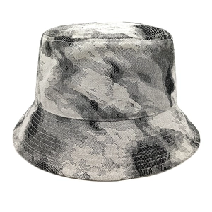 Close-up of black and white tie-dye bucket hat with durable cotton twill texture