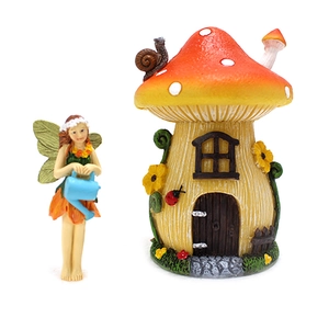 Detailed set featuring a resin flower fairy with a watering can and a colorful mushroom house