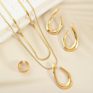 Gold stainless steel jewelry set featuring a double layer necklace, earrings, and ring
