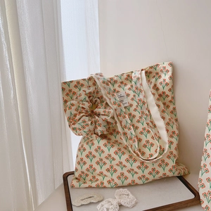Vintage floral cotton tote bag and matching scrunchie set for women in orange flower print