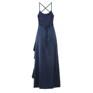 Detail of navy blue satin dress featuring an elegant backless lace-up cross strap design