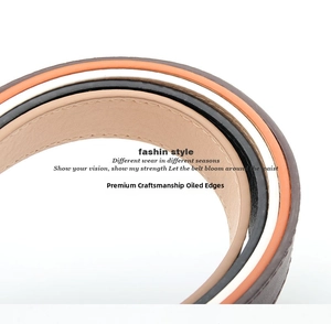 Detail of premium edge paint finish on multiple colors of leather belts with fine stitching