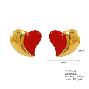 Macro shot of 24mm x 18mm heart stud earrings with 18K gold plated steel and red enamel