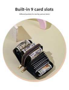 Detail view of compact accordion card wallet showing 9 card slots and gold zippers