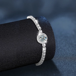 Sparkling 925 sterling silver bracelet featuring a brilliant round moissanite centerpiece