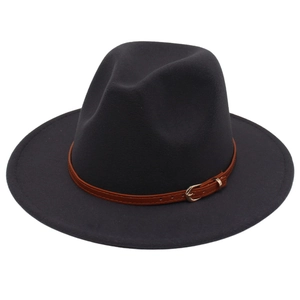 Detail of dark grey fedora hat with brown faux leather belt and gold metal buckle