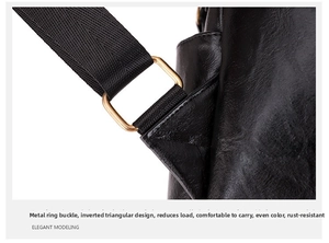 Detail view of durable black nylon strap with golden metal buckle on leather backpack