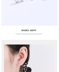 Macro shot and model show of silver flower stud earrings with zircon inlays