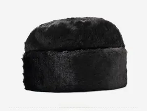 Side view of black faux fur Russian style winter hat for men showing dense texture