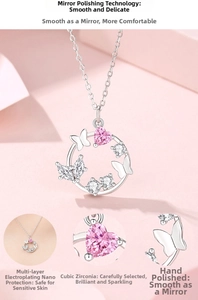Macro detail of S925 silver necklace featuring cubic zirconia butterfly and pink heart stone
