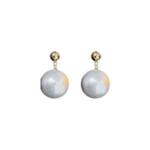 Minimalist gold plated pearl drop earrings featuring glossy white beads on a white background