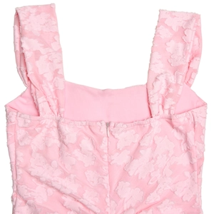 Dettaglio del retro del top senza maniche rosa in jacquard con zip invisibile