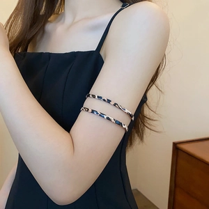 Retro leopard print twisted cuff bracelets in gold and black for women on arm