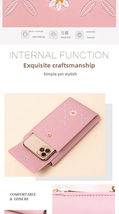 Macro detail of pink leather phone wallet featuring floral embroidery and gold hardware