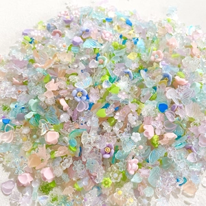 Mixed resin charms kit featuring flowers, butterflies, and hearts in macaron colors