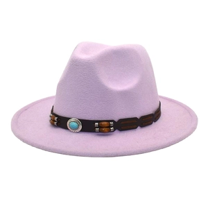Detail of lavender wool fedora hat featuring a brown belt with turquoise ornaments