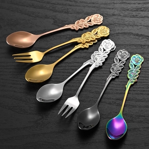 Set of stainless steel rose handle dessert spoons and forks in gold and rose gold finish