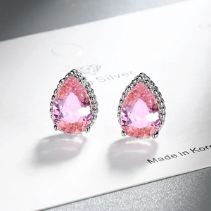 Elegant teardrop pink zircon stud earrings with silver plating on display card