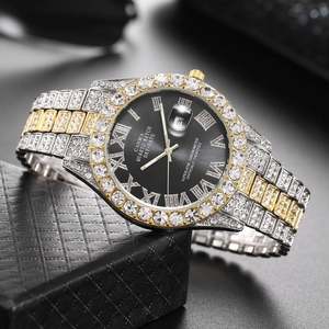 Macro shot of luxury gold and silver quartz watch with crystal-encrusted bezel on gift box