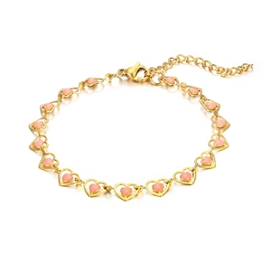 Detailed view of bohemian gold heart link bracelet with pink resin stones and lobster clasp