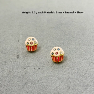 Detailed view of ice cream cake earrings with colorful zircon inlay and brass base