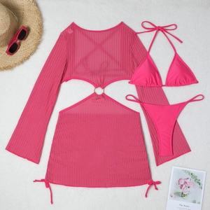 Flat lay of rose pink three-piece bikini set with mesh hollow-out cover-up dress