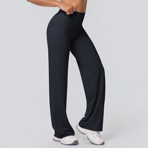 Close-up of black high-waisted flared yoga pants with premium matte elastic fabric