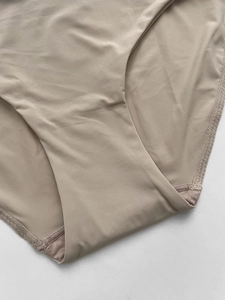 Close-up of seamless ice silk fabric with reinforced zigzag stitching on the crotch part