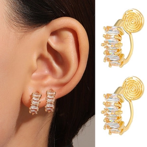 Detail view of gold U-shaped ear clip with five rectangular cubic zirconia and screw back