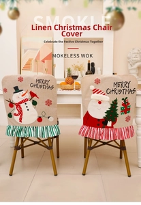 Detail of burlap Christmas chair covers featuring Santa, snowman and MERRY CHRISTMAS embroidery
