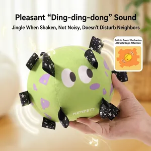 Green plush interactive dog ball with purple patterns and built-in squeaker for play