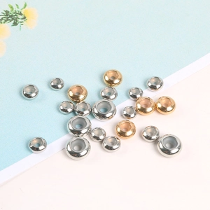 Détails des perles de positionnement en or et argent avec insert en silicone pour bijoux