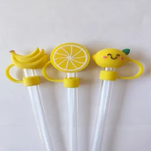 Cartoon fruit silicone straw topper set featuring banana and lemon designs for dust protection