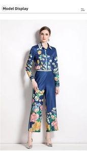 Detailed close-up of vibrant floral print shirt with white contrast collar and trim