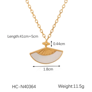 Detail of fan-shaped white shell necklace with star motif and size dimensions