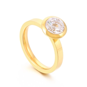 Minimalist gold titanium steel ring featuring a sparkling round zircon stone in a bezel setting