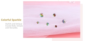 Macro shot of multi-faceted Aurora Borealis crystal beads on pink mesh background