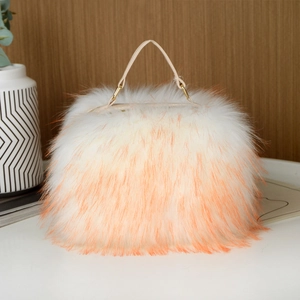 Detail of white and orange gradient faux fur handbag on a minimalist table