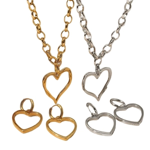 316L stainless steel jewelry set featuring hollow heart necklaces and earrings in gold and silver