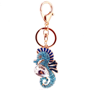 Blue rhinestone seahorse keychain with gold metal ring and lobster clasp on white back
