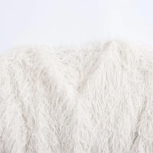 Veste élégante en fausse fourrure blanche pour femme avec fibres longues et franges