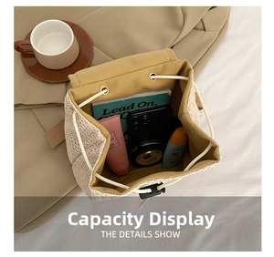 Detail view of woven bucket bag interior showing capacity for phone and cosmetics