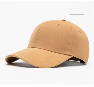 Close-up of light tan baseball cap with premium twill texture and curved brim detail