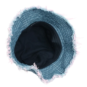 Blue denim bucket hat with frayed pink edges and black lining in top-down view