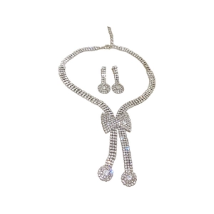 Luxury rhinestone bow necklace and earrings set with shimmering geometric pendants
