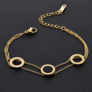 Elegant 18K gold double-chain bracelet with Roman numeral rings and black shell inlay