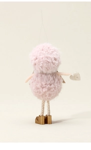 Detailed view of pink plush angel ornament with golden boots and fluffy texture