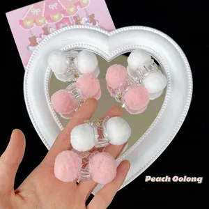 Cute pink and white plush ball hair claw clip for women's autumn winter styling