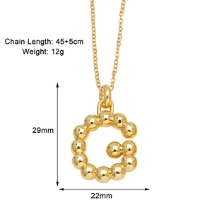 Detailed view of golden 3D letter G pendant necklace with 45+5cm chain size specs